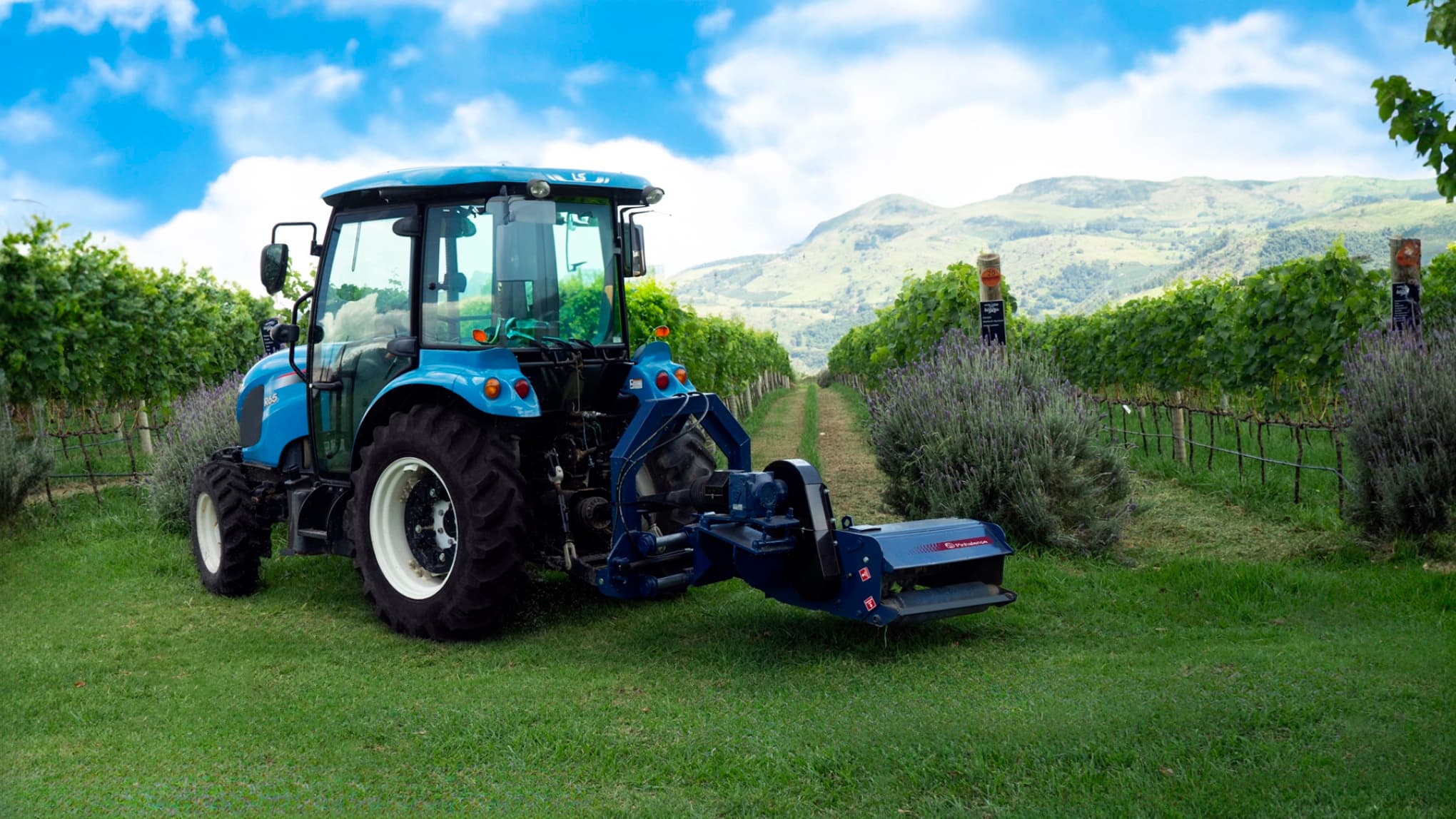 Tractor operating with a versatile flail mower Pinhalense
